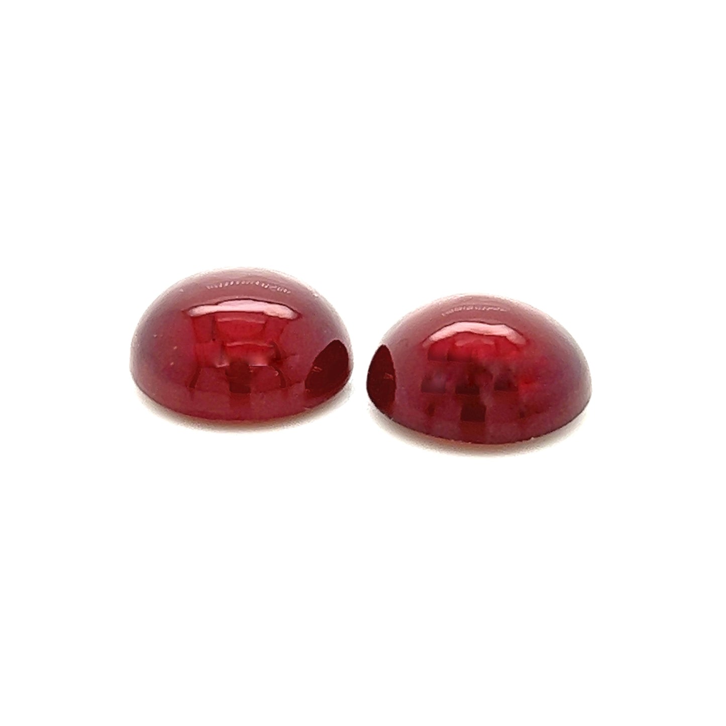 Granate Paar oval gemugelt (Hessonite, Cabochons)
