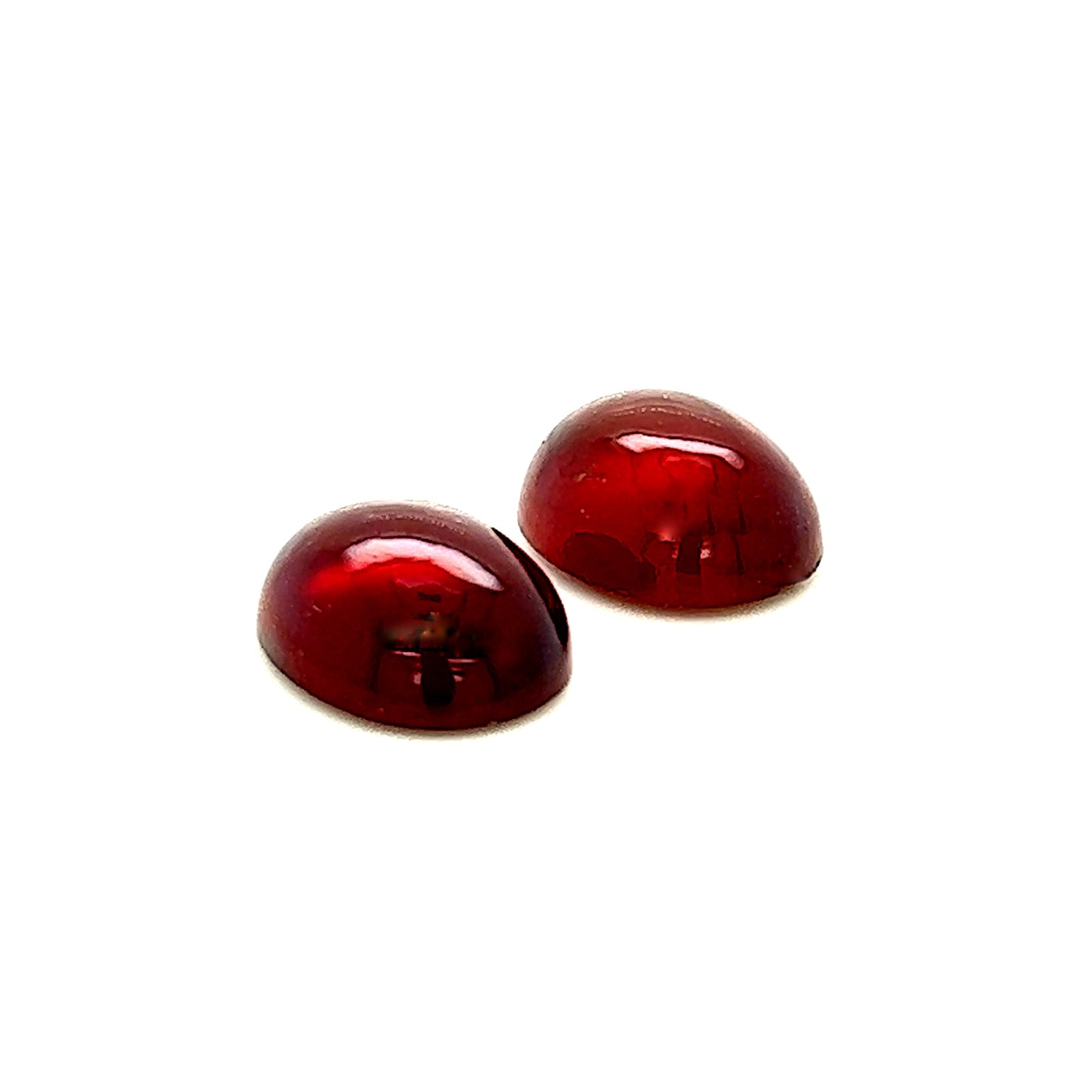 Granate Paar oval gemugelt (Hessonite, Cabochons)