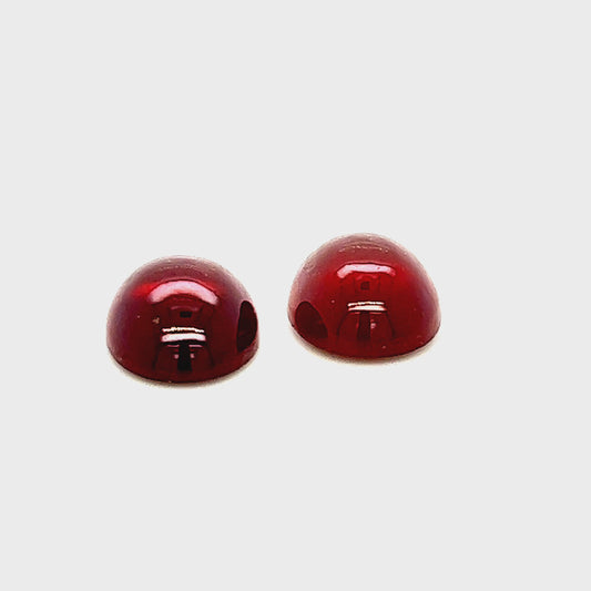 Granate Paar oval gemugelt  (Hessonite, Cabochons)