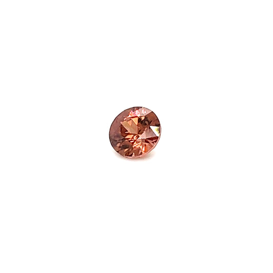 Zirkon in lachs/rose Farbe, rund facettiert
